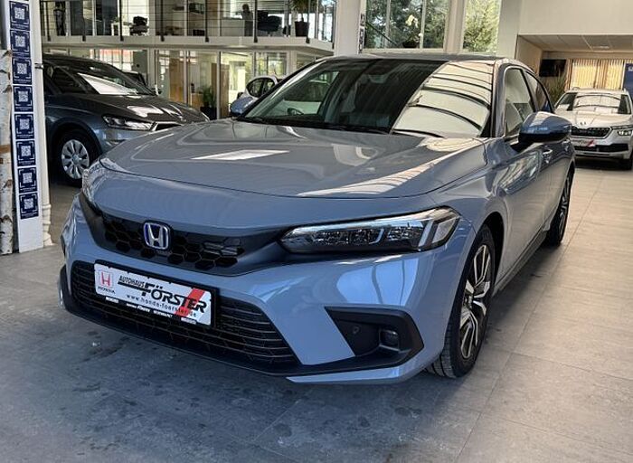 Honda Civic Lim. 5-trg. e:HEV Elegance, Navi